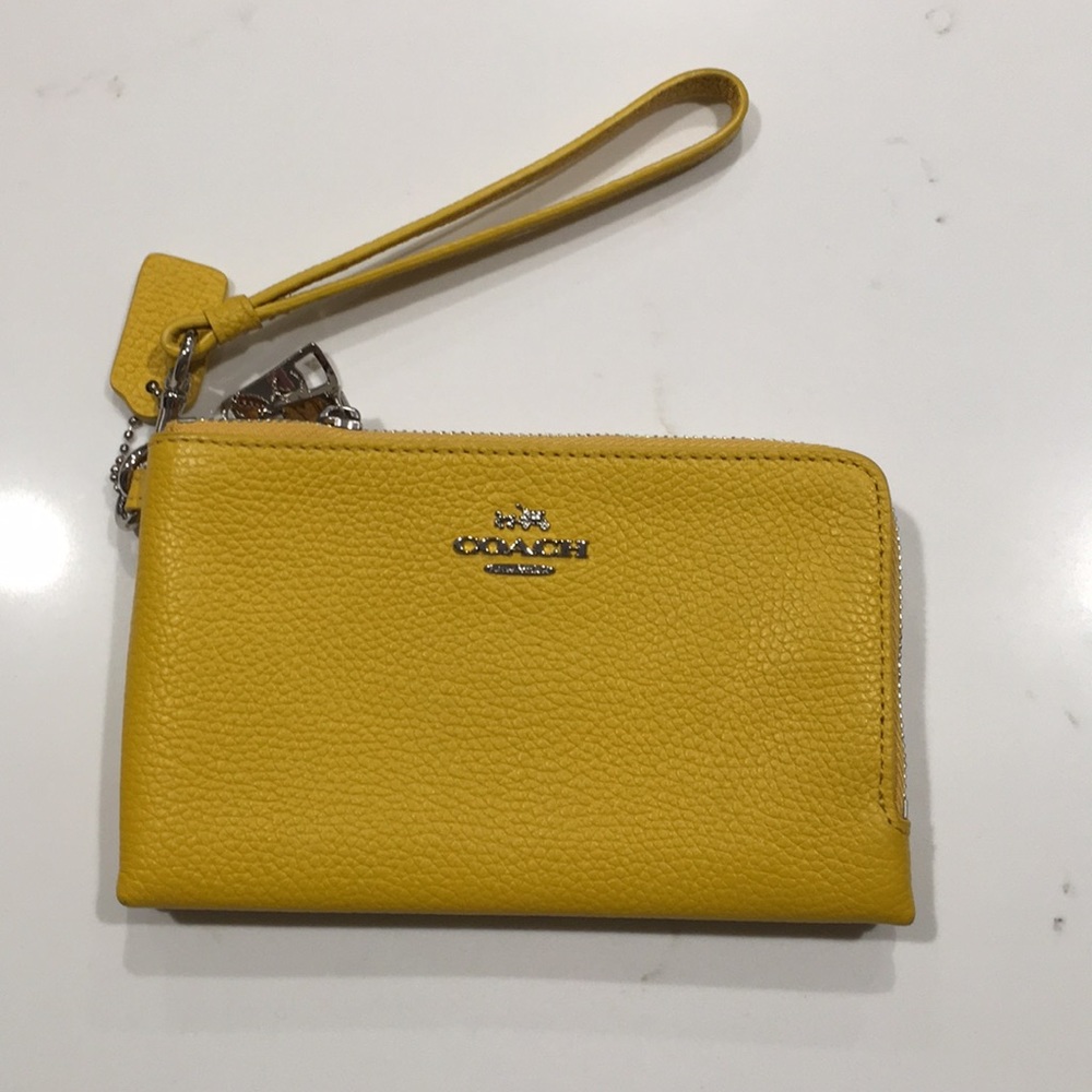 Coach wristlet in bright yellow leather